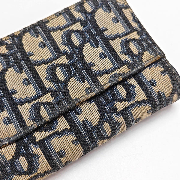 Authenticated pre-owned Saddle Monogram Canvas Blue Card Holder - Card Holder at Looply