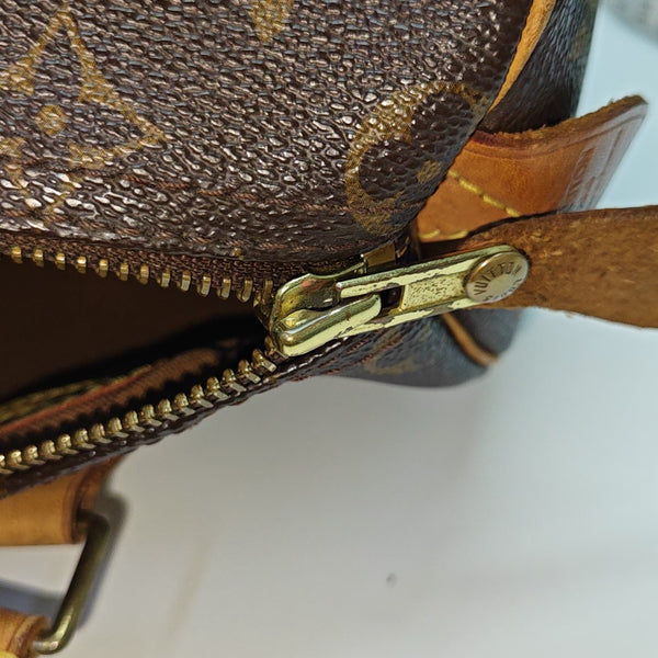 SPEEDY 25 Monogram Coated Canvas Brown