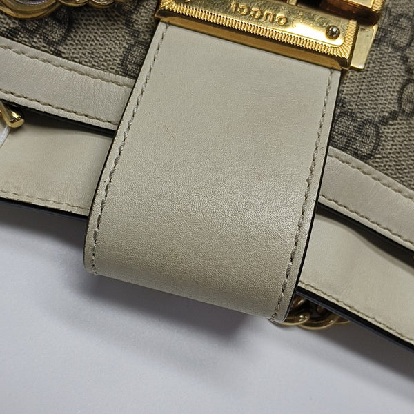 Padlock Small Monogram Coated Canvas Beige