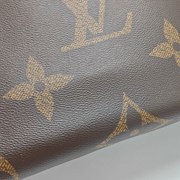 ONTHEGO MM Monogram Coated Canvas Brown