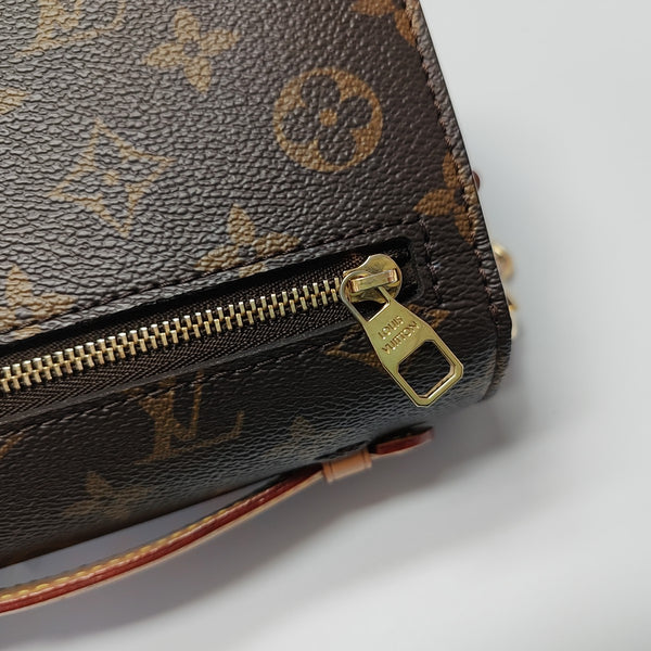 MÉTIS EAST WEST Monogram Coated Canvas Brown