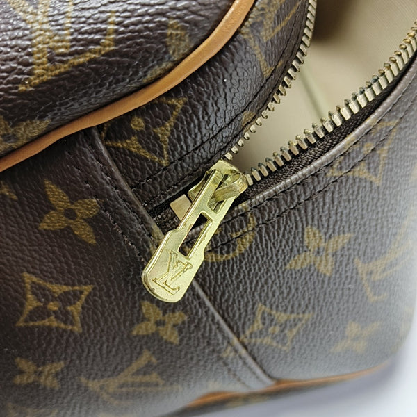 EXCURSION Monogram Coated Canvas Brown