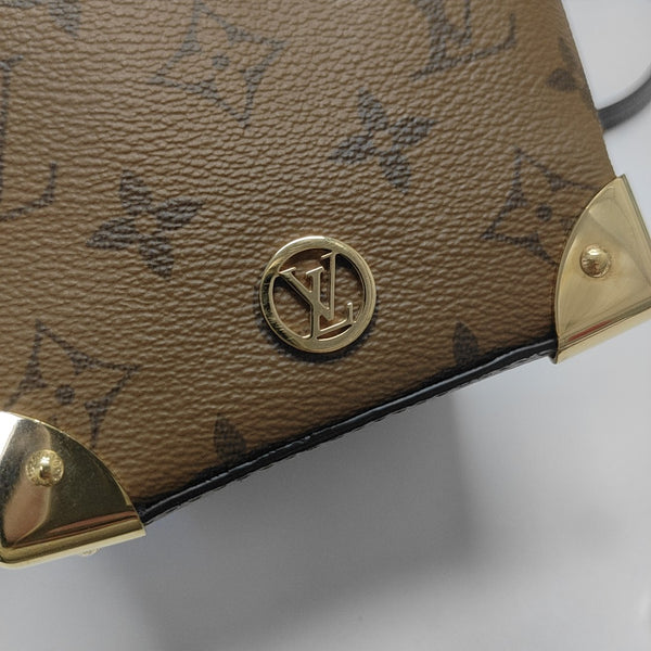 NOÉ PURSE LV CHARMS Monogram Coated Canvas Brown