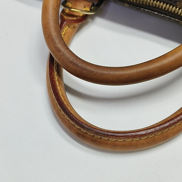 ALMA PM Monogram Coated Canvas Brown