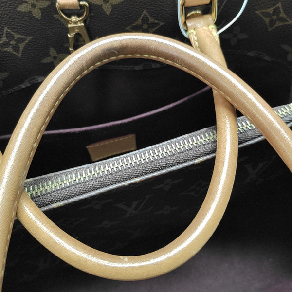 MONTAIGNE GM Monogram Coated Canvas Brown