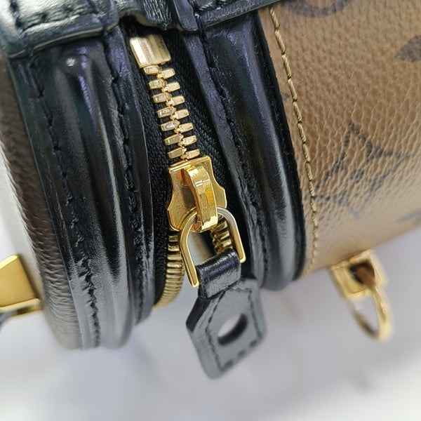 CANNES PM Monogram Coated Canvas Brown