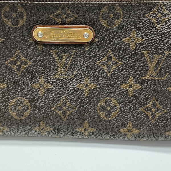 Pochette Eva Monogram Coated Canvas Brown