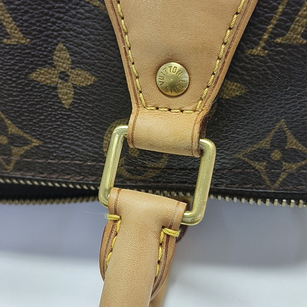 SPEEDY 25 Monogram Coated Canvas Brown