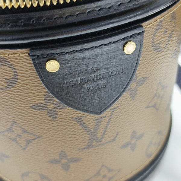 CANNES PM Monogram Coated Canvas Brown