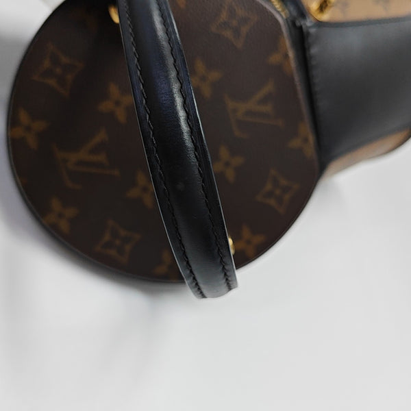 CANNES PM Monogram Coated Canvas Brown
