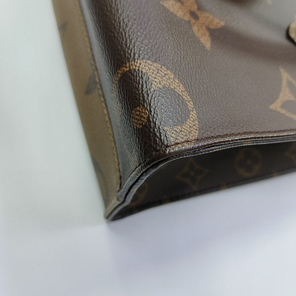 ONTHEGO PM Monogram Coated Canvas Brown