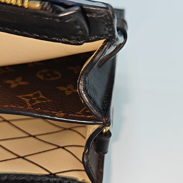TRUNK Monogram Coated Canvas Brown