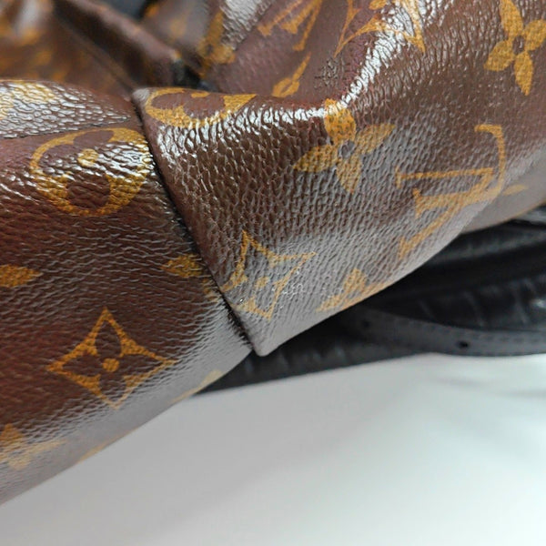 Authenticated pre-owned PALM SPRINGS MM Monogram Coated Canvas Brown - Backpack at Looply