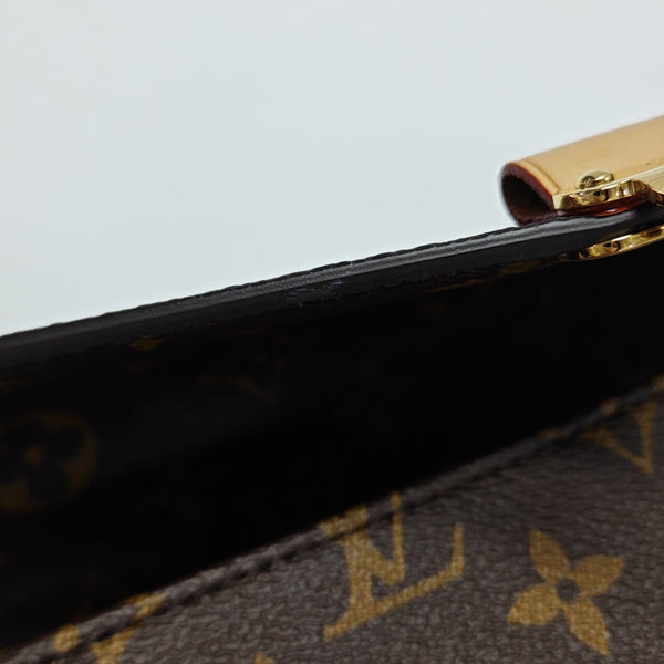 MÉTIS EAST WEST Monogram Coated Canvas Brown