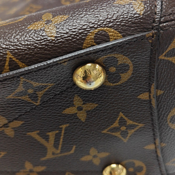 MONTAIGNE GM Monogram Coated Canvas Brown