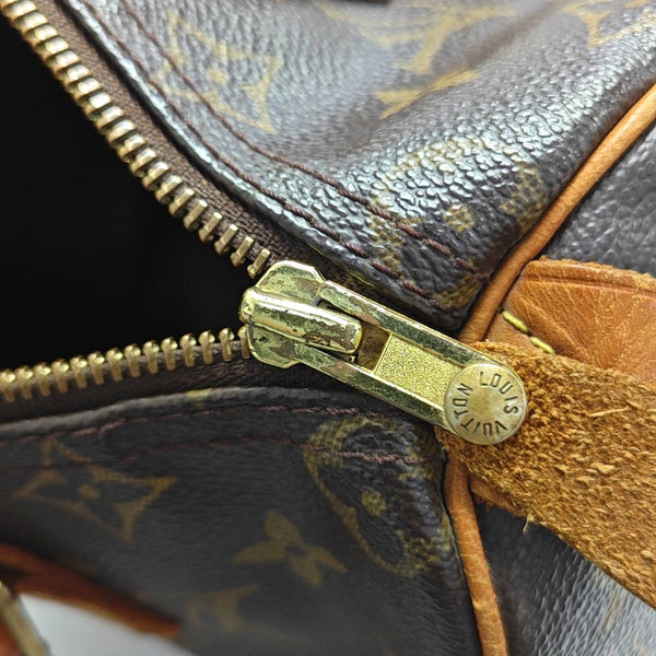 SPEEDY 25 Monogram Coated Canvas Brown