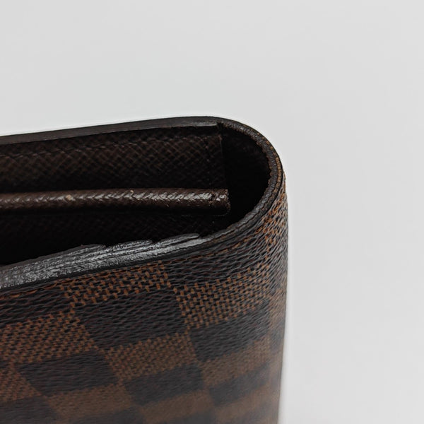 JAMES Damier Ebene Coated Canvas Brown