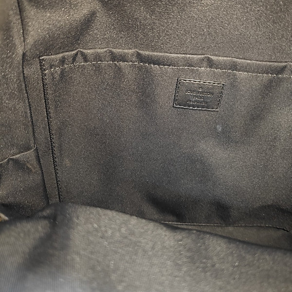 Monogram Coated Canvas Backpack Brown