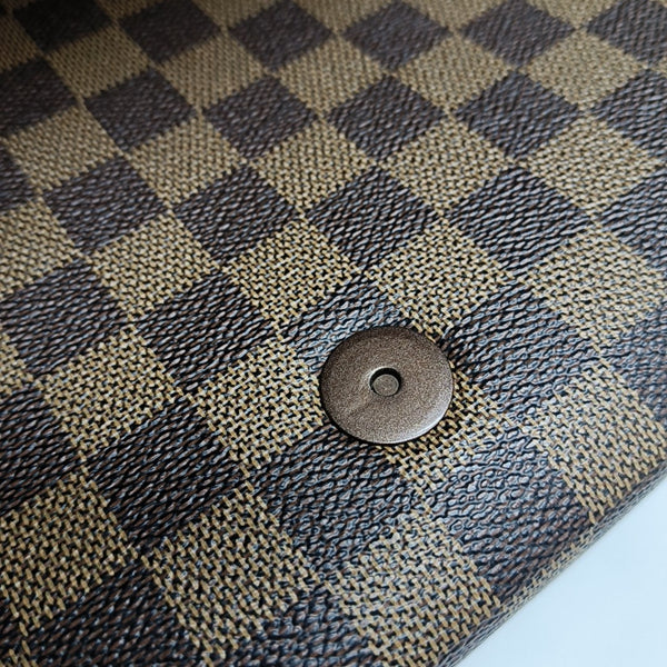 TRIBECA Damier Ebene Coated Canvas Brown