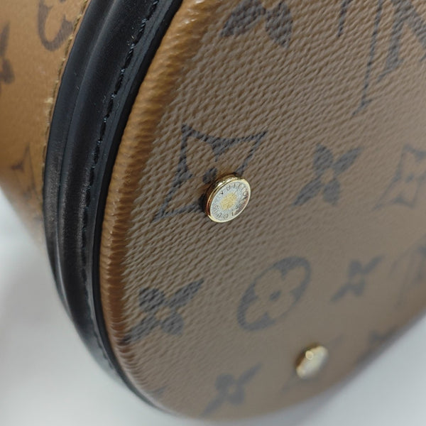 CANNES PM Monogram Coated Canvas Brown