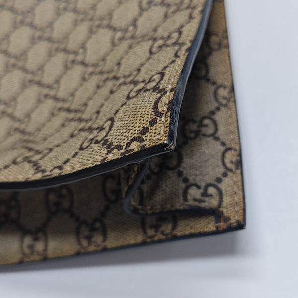 GG Supreme Monogram Coated Canvas Brown