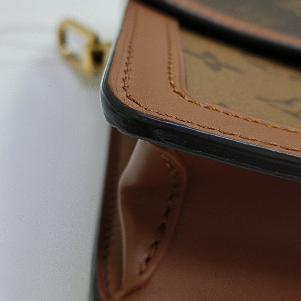 DAUPHINE MM Monogram Coated Canvas Brown