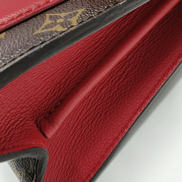VICTOIRE Monogram Coated Canvas Brown