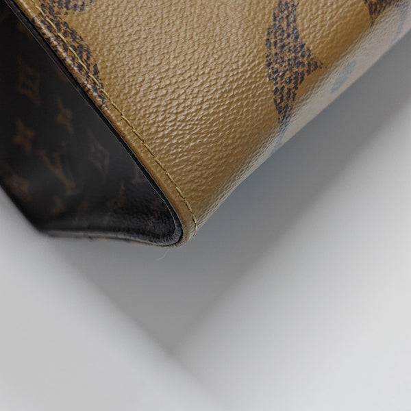 ONTHEGO GM Monogram Coated Canvas Brown