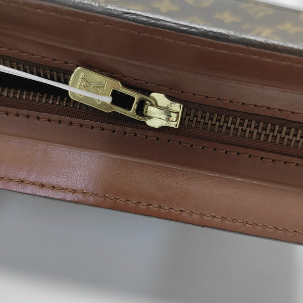 Monogram Coated Canvas Clutch Brown