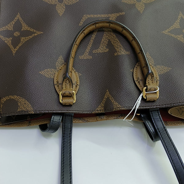 ONTHEGO MM Monogram Coated Canvas Brown