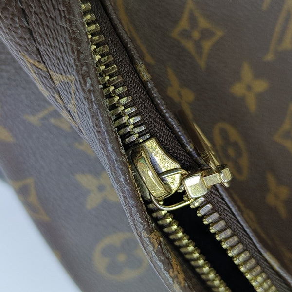 Monogram Coated Canvas Backpack Brown
