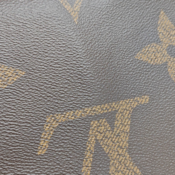 ONTHEGO MM Monogram Coated Canvas Brown