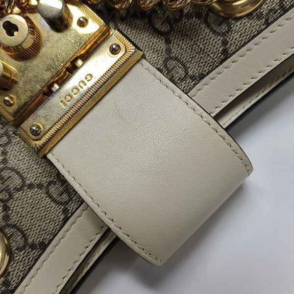 Padlock Small Monogram Coated Canvas Beige