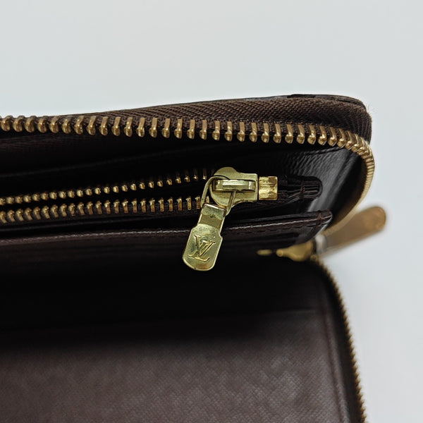 ZIPPY Damier Ebene Coated Canvas Brown Wallet