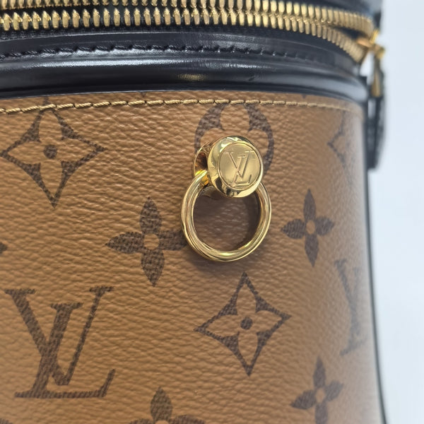 CANNES PM Monogram Coated Canvas Brown
