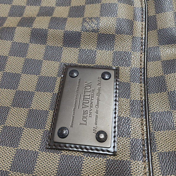 DISTRICT MM Damier Ebene Coated Canvas Brown