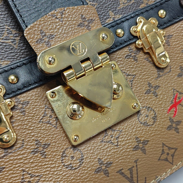 TRUNK Monogram Coated Canvas Brown