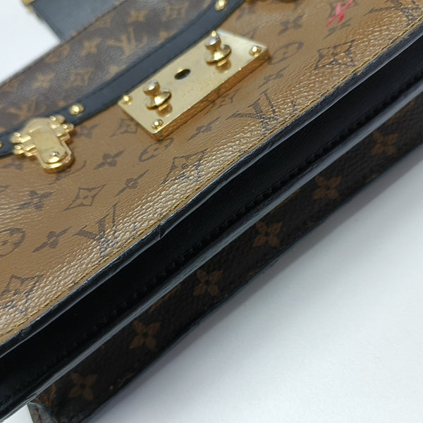 TRUNK Monogram Coated Canvas Brown