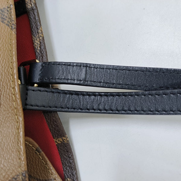 ONTHEGO MM Monogram Coated Canvas Brown