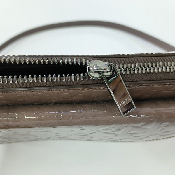 Authenticated pre-owned Saddle Monogram Patent Leather Grey - Shoulder Bag at Looply