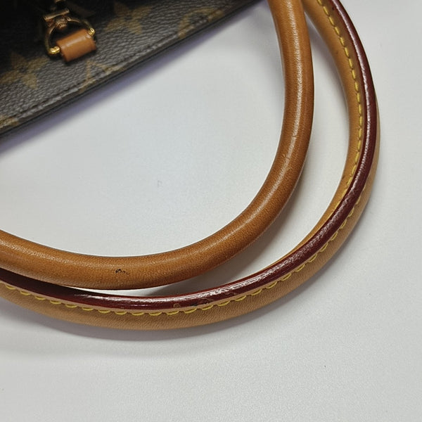 MONTAIGNE Monogram Coated Canvas Brown