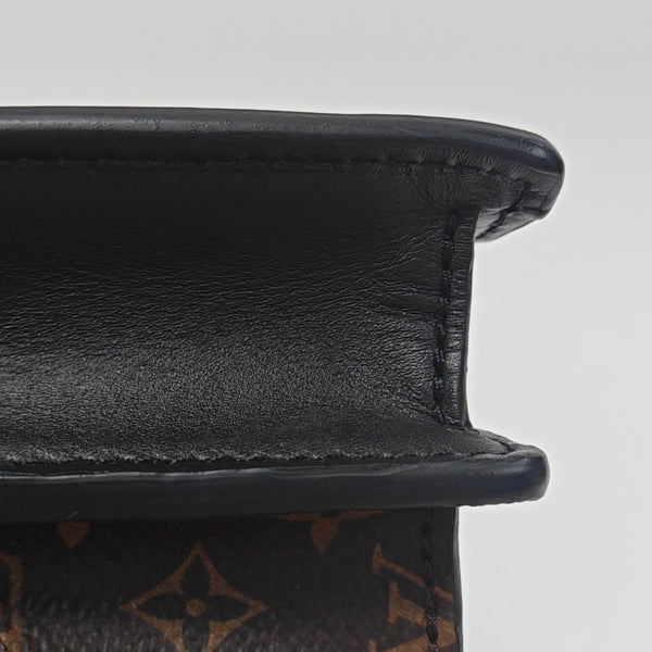 TRUNK Monogram Coated Canvas Brown