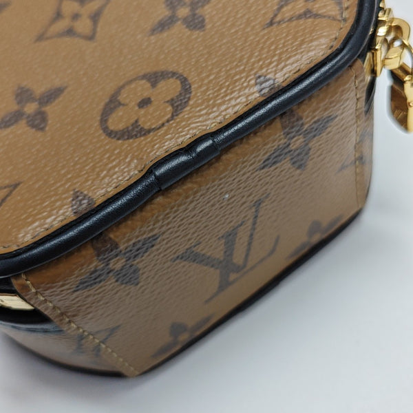 BOITE CHAPEAU Mini Monogram Coated Canvas Brown