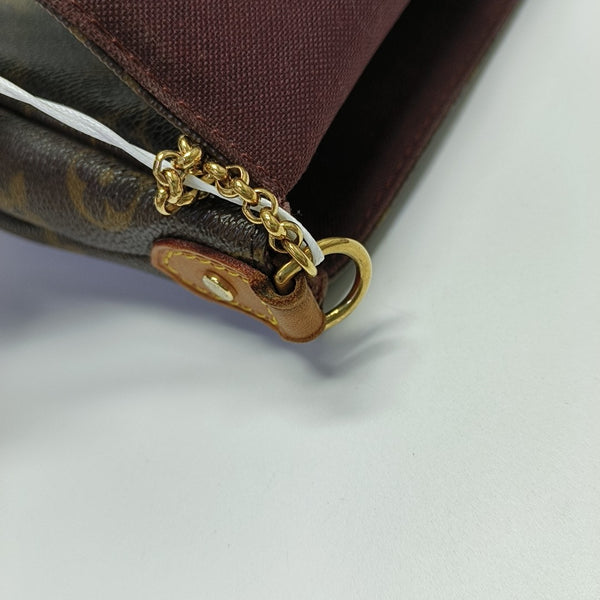FAVORITE PM Monogram Coated Canvas Brown