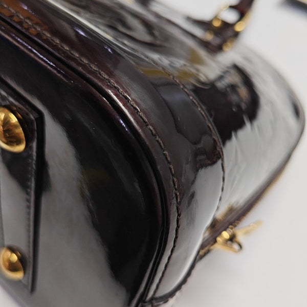 ALMA PM Monogram Patent Leather Red