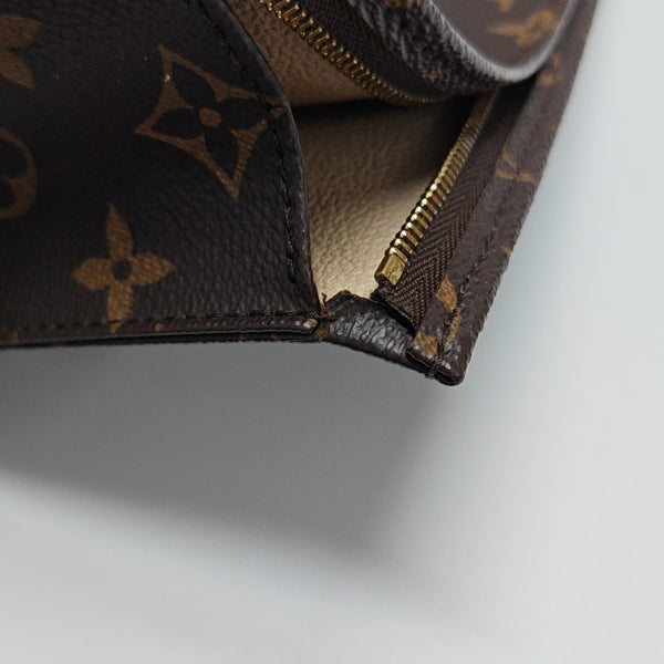TOILET POCKET 26 Monogram Coated Canvas Brown