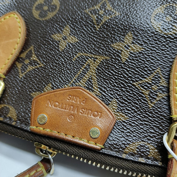 TURENNE Monogram Coated Canvas Brown