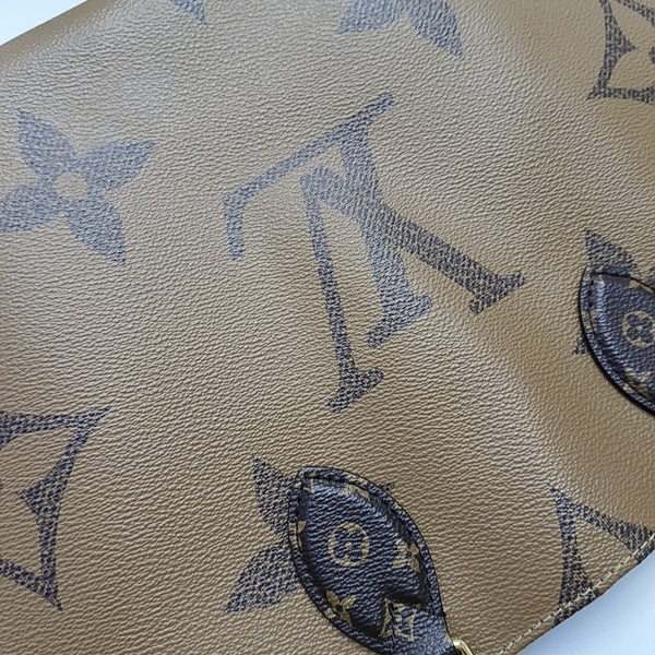 ONTHEGO MM Monogram Coated Canvas Brown