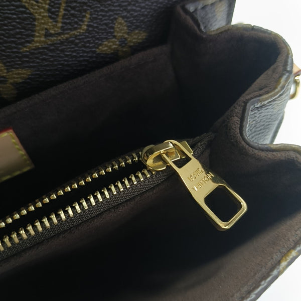 MÉTIS EAST WEST Monogram Coated Canvas Brown