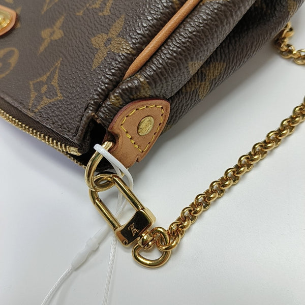 EVA Monogram Coated Canvas Brown